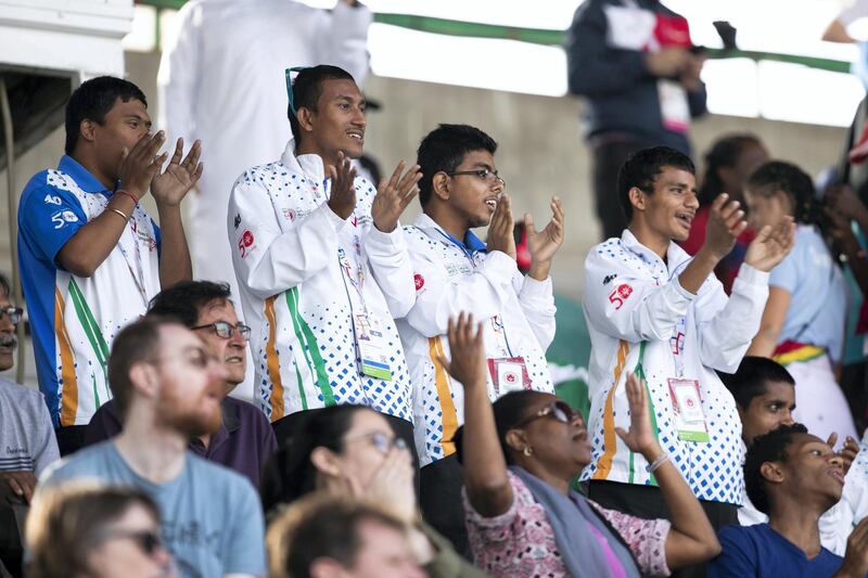 DUBAI, UNITED ARAB EMIRATES - March 16 2019.

Audiences cheering the athlete runners at Special Olympics World Games athletics competition in Dubai Police Academy Stadium.

 (Photo by Reem Mohammed/The National)

Reporter: 
Section:  NA