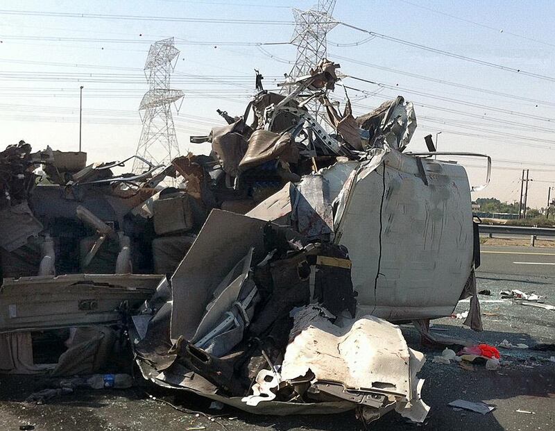 Thirteen people died and more than a dozen were injured when a bus hit a lorry stopped on the roadside close to the Dubai Club bridge. Courtesy Dubai Police 