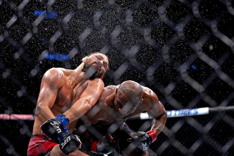 Kamaru Usman (red gloves) in action against Jorge Masvidal, USA Today