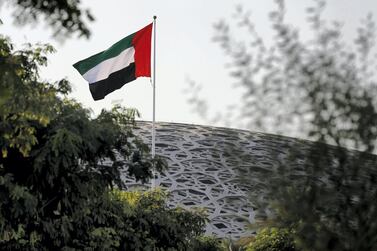 The UAE flag at the Louvre Abu Dhabi. Victor Besa / The National