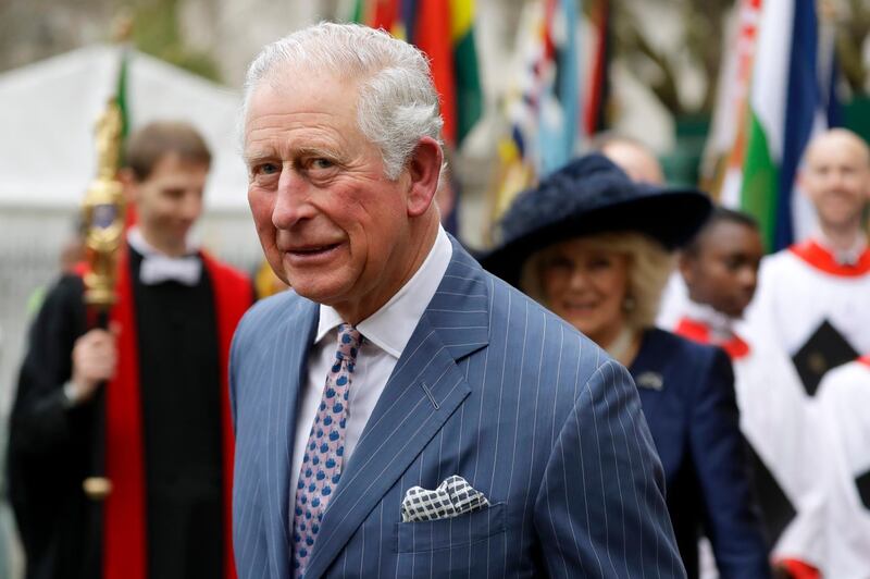 FILE - In this Monday, March 9, 2020 file photo, Britain's Prince Charles and Camilla the Duchess of Cornwall, in the background, leave after attending the annual Commonwealth Day service at Westminster Abbey in London, Monday, March 9, 2020. Prince Charles, the heir to the British throne, has tested positive for the new coronavirus. The princeâ€™s Clarence House office reported on Wednesday, March 25, 2020 that the 71-year-old is showing mild symptoms of COVID-19 and is self-isolating at a royal estate in Scotland. For most people, the coronavirus causes mild or moderate symptoms, such as fever and cough that clear up in two to three weeks (AP Photo/Kirsty Wigglesworth, File)