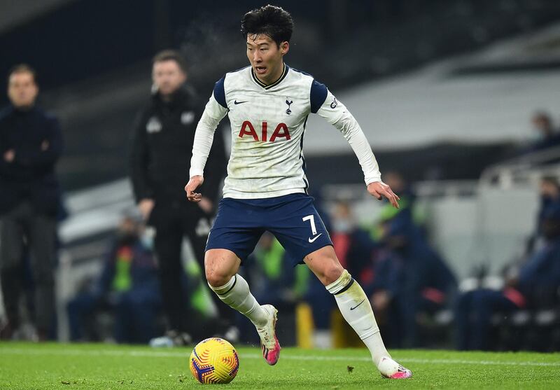 Tottenham Hotspur's South Korean striker Son Heung-Min on the ball during the English Premier League football match between Tottenham Hotspur and Fulham at Tottenham Hotspur Stadium in London, on January 13, 2021. (Photo by Glyn KIRK / POOL / AFP) / RESTRICTED TO EDITORIAL USE. No use with unauthorized audio, video, data, fixture lists, club/league logos or 'live' services. Online in-match use limited to 120 images. An additional 40 images may be used in extra time. No video emulation. Social media in-match use limited to 120 images. An additional 40 images may be used in extra time. No use in betting publications, games or single club/league/player publications. / 