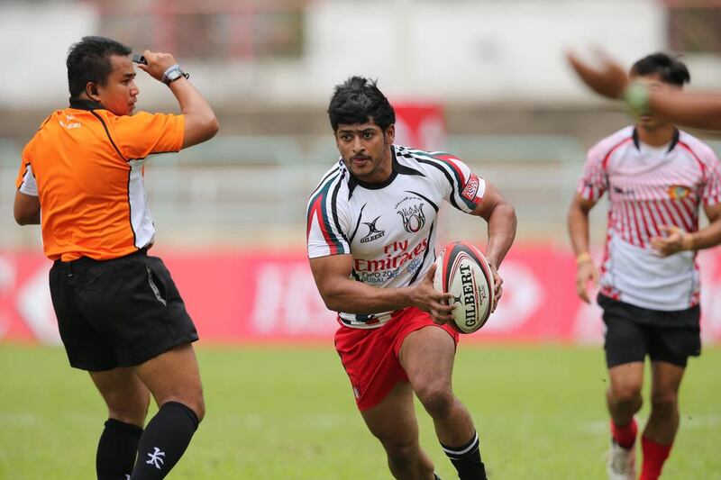 Imad Reyal, centre, has moved from Abu Dhabi Harlequins to Jebel Ali Dragons, his third team in as many seasons.  Elite Step