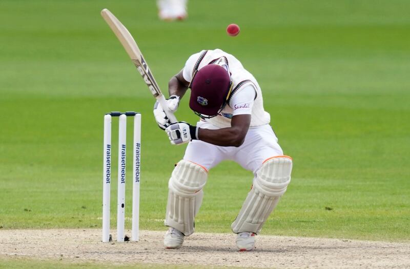 West Indies batsman Shamarh Brooks avoids a bouncer by England's Ben Stokes. AP