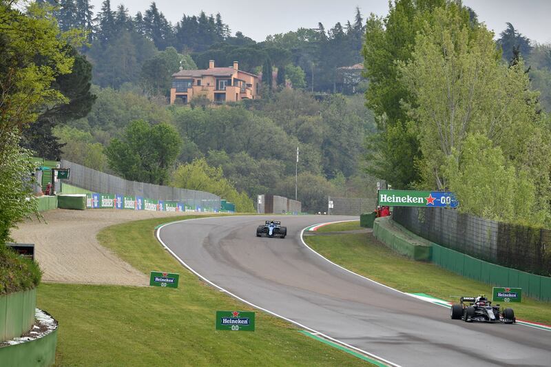 The F1 cars race at the Emilia Romagna Grand Prix at Imola in 2021. Reuters