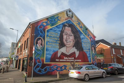 The mural of Bobby Sands, the Provisional IRA member who died after a 66-day hunger strike in a prison in Northern Ireland, on the side of the Sinn Fein Party headquarters in West Belfast. Photo: Paul McErlane / The National