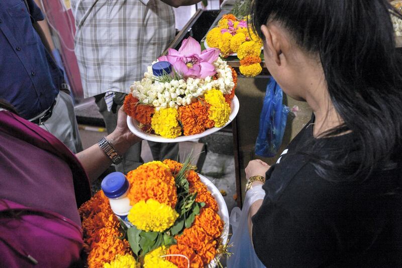 DUBAI, UNITED ARAB EMIRATES. 24 OCTOBER 2019. As the Hindu Festival of Diwali starts in the UAE, devotees flok to the Hindu Temple in Bur Dubai to worship. Adjacent to the Temple is what is commonly refered to “Hindi Lane”, a small corridor of shops selling flowers, offerings and general items for Hindu ceremonies. Diwali, Deepavali or Dipavali is a four-to-five day-long festival of lights, which is celebrated by Hindus, Jains, Sikhs and some Buddhists every autumn in the northern hemisphere. (Photo: Antonie Robertson/The National) Journalist: None. Section: National.
