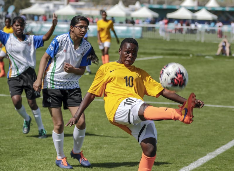 Abu Dhabi, March 18, 2019.  Special Olympics World Games Abu Dhabi 2019. Uganda (yellow)  VS. India  (blue) Women's football. at the Mubadala football pitches.  
Victor Besa/ The National
Section:  NA
Reporter: Ramola Talwar