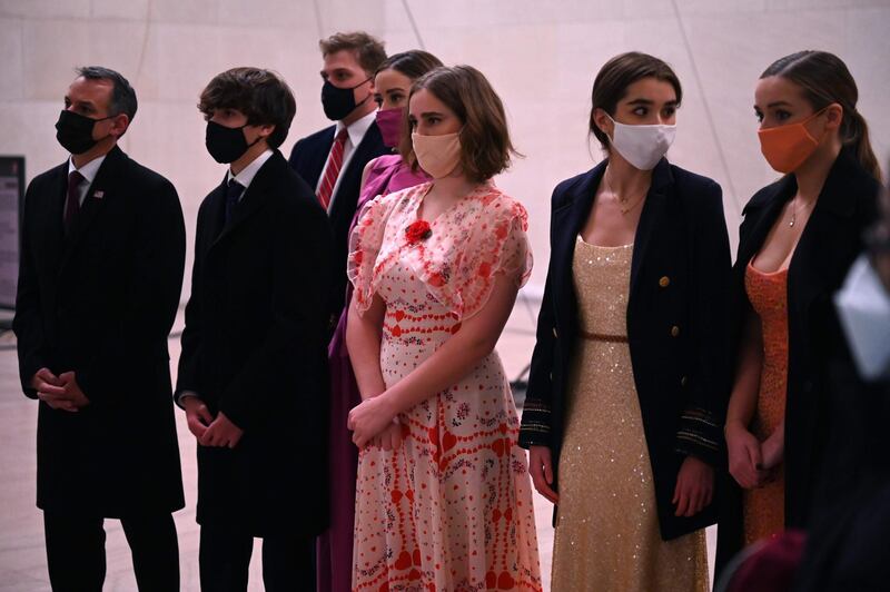 US President Joe Biden's grandchildren and family members attend the 'Celebrating America' inaugural programme at the Lincoln Memorial in Washington. AFP