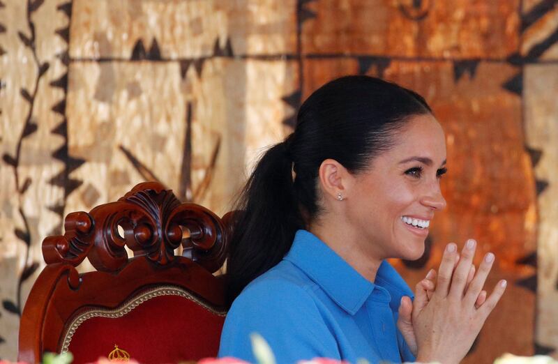 Meghan, Duchess of Sussex, smiles at the unveiling of the Queen's Commonwealth Canopy, in Tupou College in Toloa, Tongatapu island. Reuters