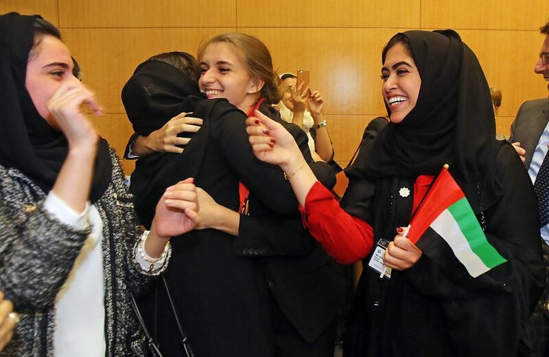 Emirati women celebrate after Dubai was selected to host the 2020 World Expo, at the OECD in Paris, Wednesday Nov. 27, 2013. Dubai will host the 2020 World Expo, becoming the first Middle Eastern city to organize the event in its more than 150-year history. (AP Photo/Remy de la Mauviniere)