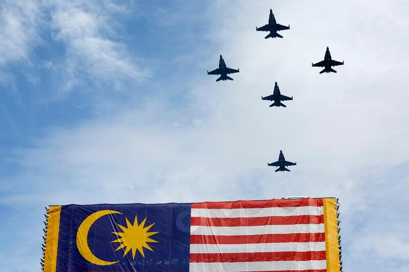 Fighter jets fly in formation. EPA