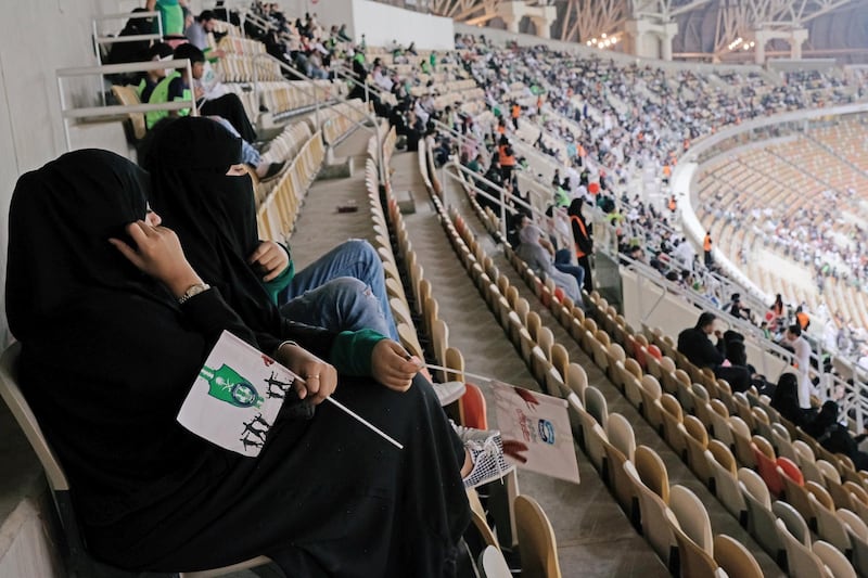 Saudi women watch the soccer match between Al-Ahli against Al-Batin at the King Abdullah Sports City in Jeddah, Saudi Arabia January 12, 2018. REUTERS/Reem Baeshen NO RESALES. NO ARCHIVES
