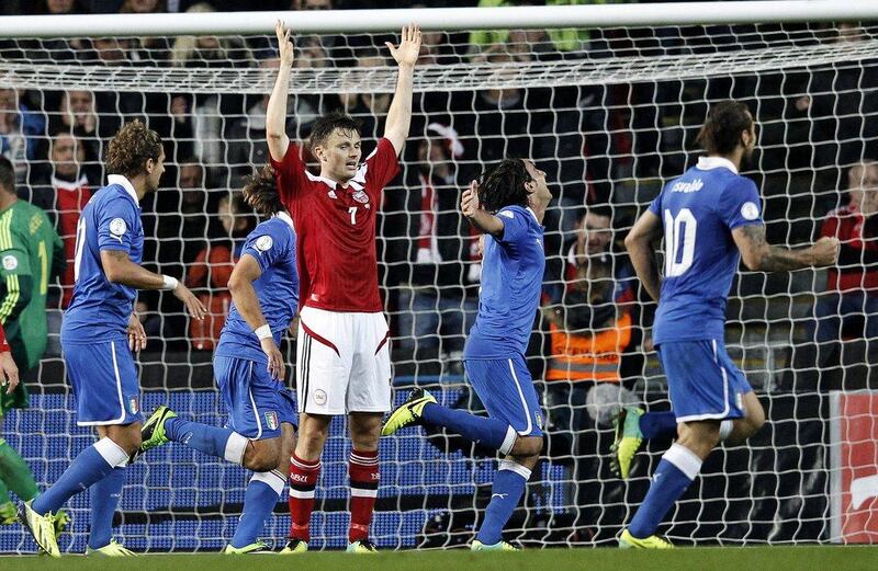 Denmark 2-2 Italy. Denmark thought they'd taken three points from the 2006 world champions before Alberto Aquilani's stoppage time equaliser. Jens Dresling / AP