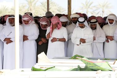 FUJAIRAH , UNITED ARAB EMIRATES , JAN 22 – 2018 :- Relatives and friends during the prayer at the funeral of seven Emirati children four girls and three boys who died of smoke inhalation on Monday morning house fire at Rul Dhadna village in Fujairah. (Pawan Singh / The National) For News. Story by Ruba Haza