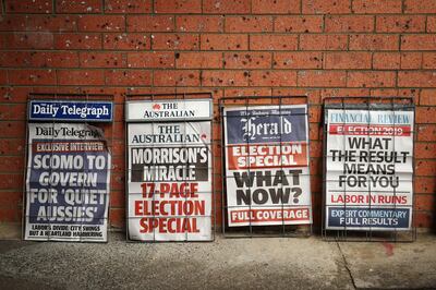 A news stand displays newspaper advertisements in Sydney, Australia, on Monday, May 20, 2019. Prime Minister Scott Morrison's center-right government will command a parliamentary majority, the Australian Broadcasting Corp. projected Monday, fueling a stock market rally as investors welcomed his surprise victory in the weekend election. Photographer: Brendon Thorne/Bloomberg