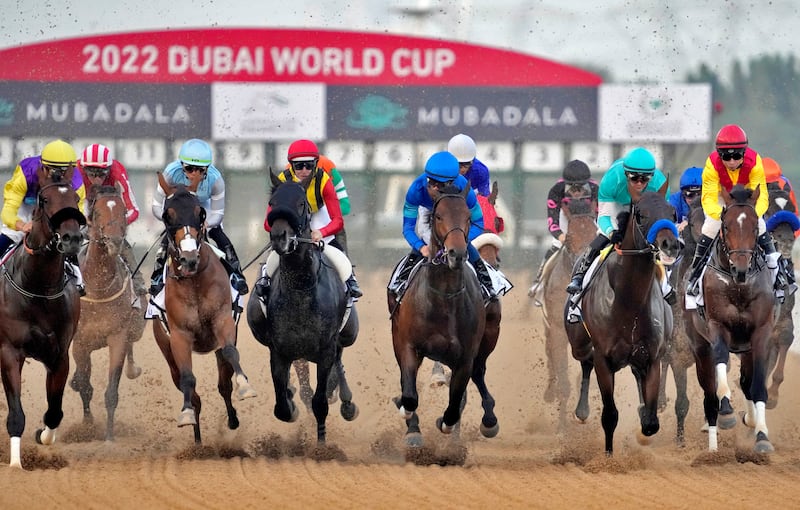 Horses with jockeys race into the first turn in Group 2 UAE Derby over 1900m (9. 5 furlongs) at Meydan Racecourse in Dubai, on March 26. AP