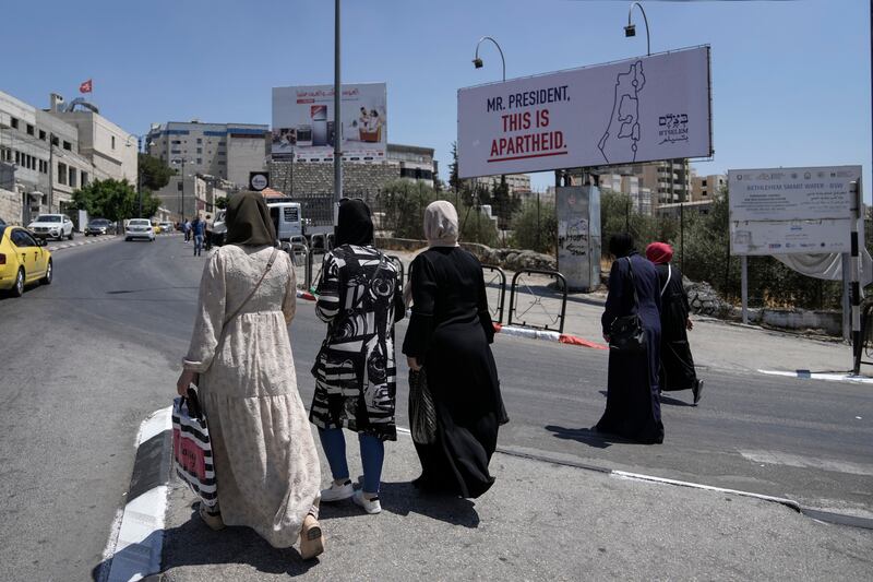 An Israeli human rights group put up the billboards before US President Joe Biden's arrival. AP