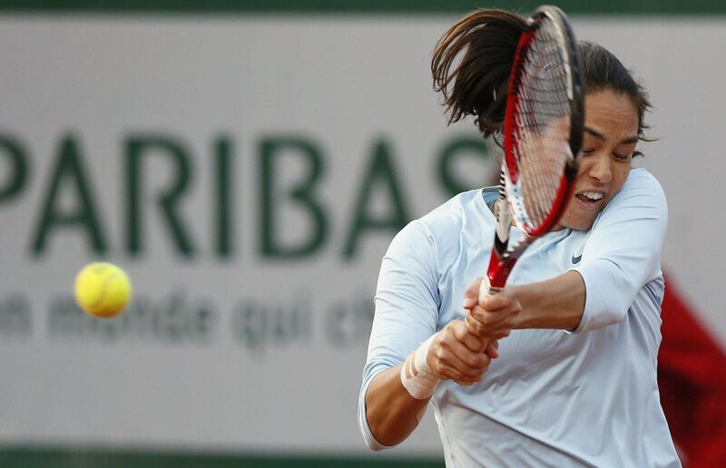 USA's Jamie Hampton returns to Serbia's Jelena Jankovic during their French Tennis Open round of sixteen match at the Roland Garros stadium in Paris, on June 3,  2013. AFP PHOTO / PATRICK KOVARIK
 *** Local Caption ***  260340-01-08.jpg