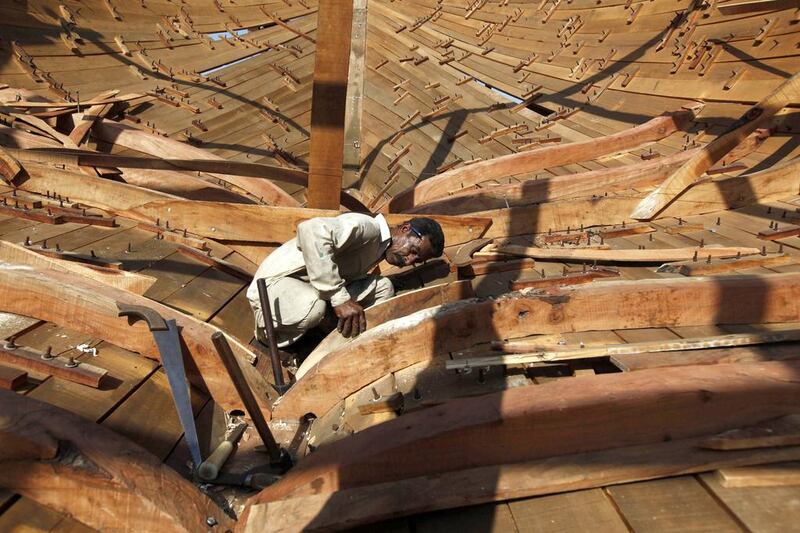 The boat sizes vary from 60 to 120 feet, and takes 15 to 20 artisans to complete in 15 months. Akhtar Soomro / Reuters