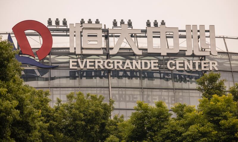 Evergrande Centre building in Shanghai, China. The heavily indebted Chinese property developer made a key offshore interest payment a day ahead of a weekend deadline, averting a default for now. EPA