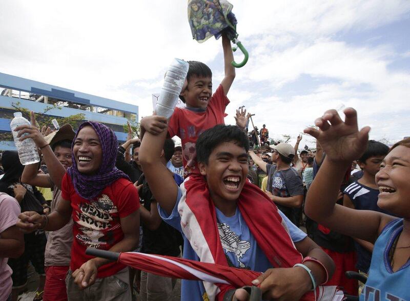 The victory offered some solace to his typhoon-devastated country. "My victory is a symbol of my people's comeback from a natural disaster and a natural tragedy," he said. Bullit Marquez / AP