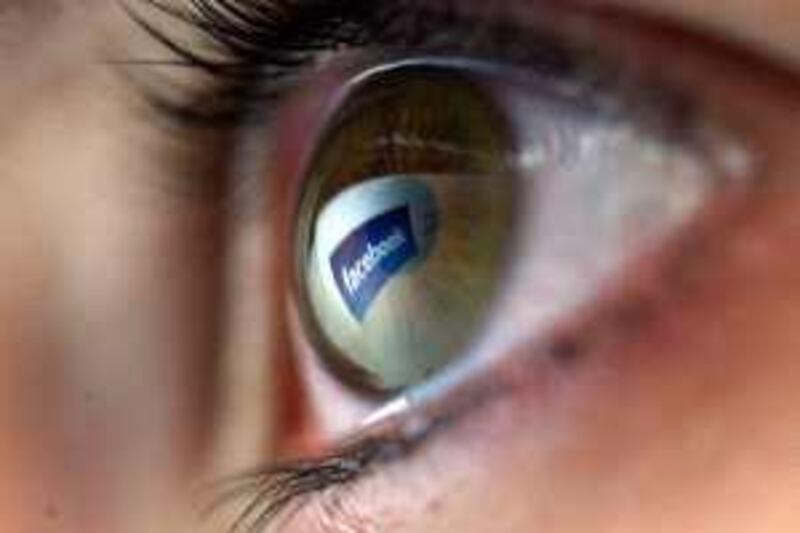 LONDON - FEBRUARY 03: (FILE PHOTO)  In this photo illustration the facebook logo is reflected in the eye of a girl on February 3, 2008 in London, England.  Social networking site 'Facebook'  reaches it's 5th birthday this month.  It was founded in 2004 by Mark Zuckerberg from his dorm room at Harvard University with the aim to help students keep in touch over the internet. Within 24 hours 1,200 Harvard students had signed up.  The site now has 150 million active users worldwide.  (Photo by Chris Jackson/Getty Images) *** Local Caption ***  GYI0056637849.jpg