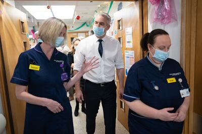 Health Secretary Steve Barclay meets staff during a visit to King's College University Hospital in London. PA