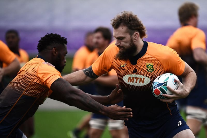 South Africa's lock RG Snyman (R) and South Africa's flanker Siya Kolisi take part in a training session Fuchu Asahi Football Park in Tokyo ahead of their Japan 2019 Rugby World Cup semi-final against Wales. AFP