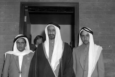 Sheikh Rashid bin Saeed Al Maktoum and his sons Sheikh Hamdan (left) and Sheikh Maktoum (right) at London Airport after arriving for a visit as guests of the British Government, 1959. PA Images / Getty Images