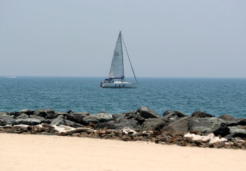 Dubai, United Arab Emirates - Reporter: N/A: News. A sail boat at Kite surfing beach as beaches in Dubai re open. Friday, May 29th, 2020. Dubai. Chris Whiteoak / The National