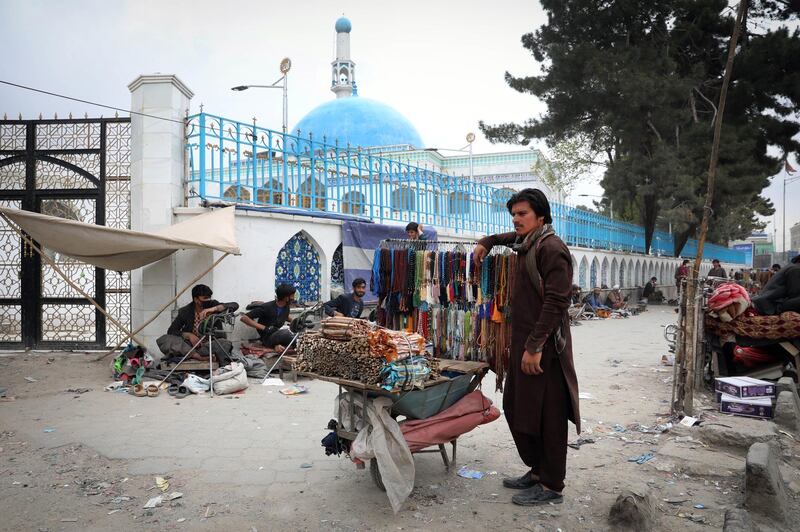 epa08382346 An Afghan man sells prayers strings (Tasbeh) as people celebrate the first day of Ramadan in downtown Kabul, Afghanistan, 24 April 2020. Muslims around the world celebrate the holy month of Ramadan, by praying during the night time and abstaining from eating, drinking, and sexual acts during the period between sunrise and sunset. Ramadan is the ninth month in the Islamic calendar and it is believed that the revelation of the first verse in Koran was during its last 10 nights.  EPA/HEDAYATULLAH AMID