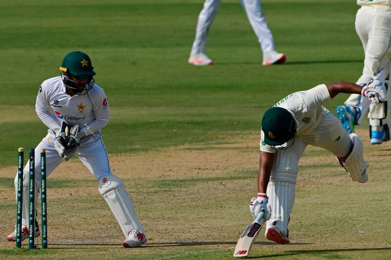 Pakistan wicketkeeper Mohammad Rizwan runs out South Africa's Temba Bavuma. AFP
