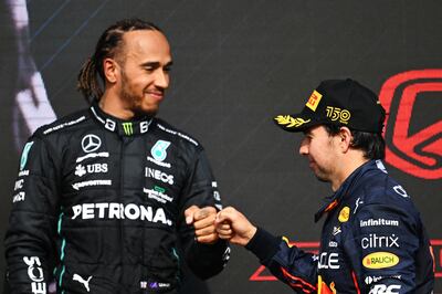 Sergio Perez and Lewis Hamilton on the podium at Silverstone. Getty