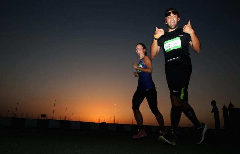 Competitors take part in the 10-kilometre Wings for Life World Run in Dubai on Sunday. Warren Little / Getty Images / May 4, 2014