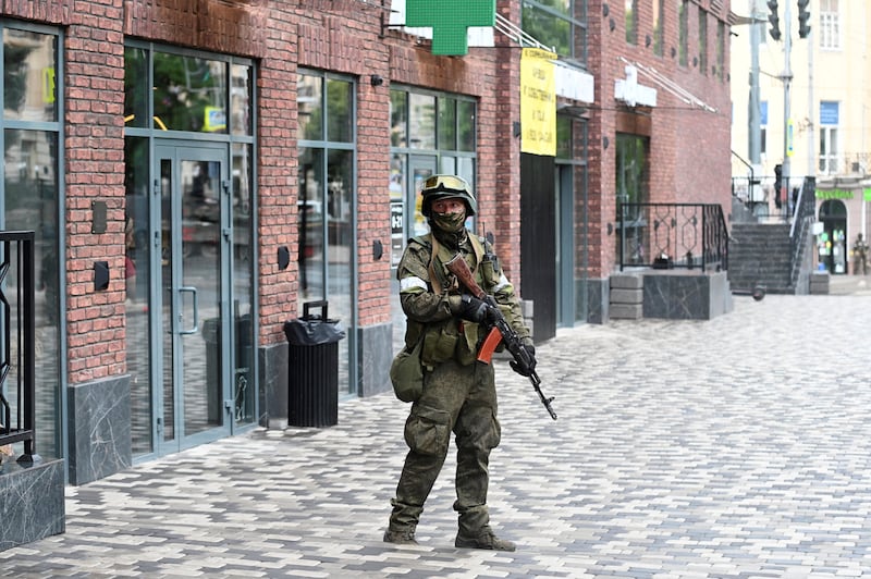 A Wagner fighter stands guard on a street in Rostov-on-Don. Reuters