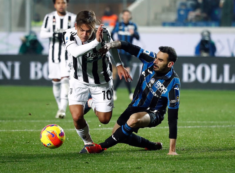 Paulo Dybala skips a challenge from Davide Zappacosta during Juventus' Serie A match against Atalanta at Stadio Atleti Azzurri, Bergamo on February 13, 2022. Reuters