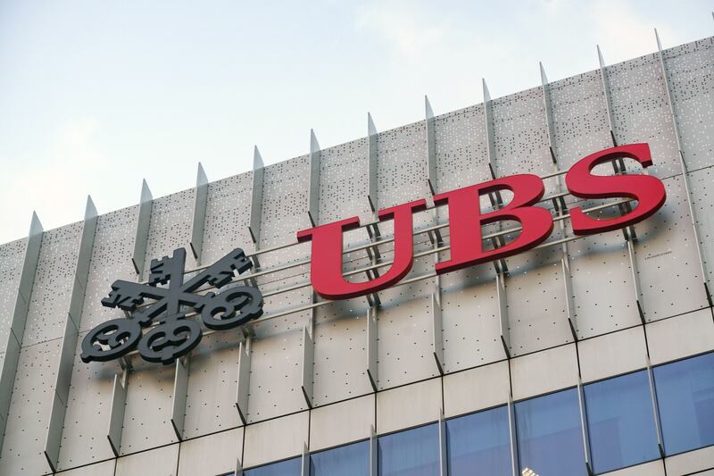 Credit Suisse private bankers in Singapore will move to UBS's flagship offices. Bloomberg