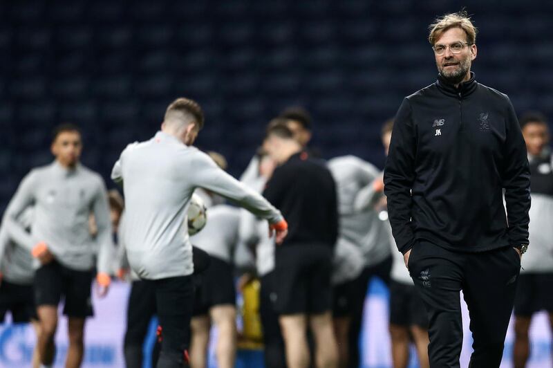 epa06522336 Liverpool's head-coach, Juergen Klopp (R) attends a training session at Dragao Stadium in Porto, Portugal, 13 February 2018. Liverpool will face FC Porto in their UEFA Champions League round of 16 first leg soccer match on 14 February 2018.  EPA/MANUEL ARAUJO