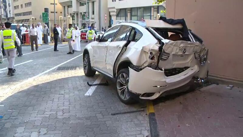 A grab from a Security Media video of the car that fell from the sixth floor of the Sheikh Khalifa Energy Complex parking lot.