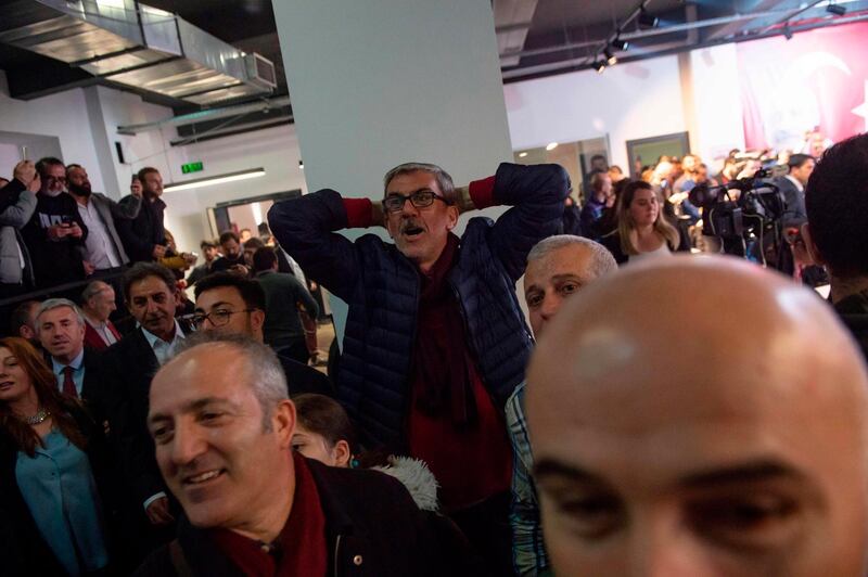 Supporters of the main opposition Republican People's Party (CHP) cheer during a press conference Istanbul, Turkey, on April 1, 2019.  AFP