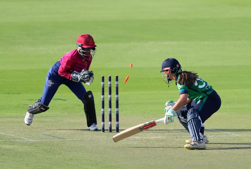 Ireland's Amy Hunter is stumped by UAE's Theertha Satish off the bowling of Esha Oza for 25