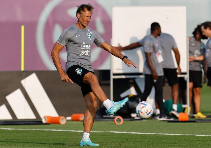 Saudi Arabia manager Herve Renard kicks a ball during a training session at the Sealine Beach Resort in Doha on November 20, 2022. AFP