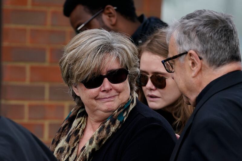 Julia Amess, the widow of Conservative MP SIr David Amess, was comforted by relatives at Belfairs Methodist Church, where he died, on Monday morning. She stayed for about 15 minutes. PA