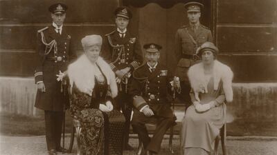 King George V, sitting centre, his wife Queen Mary, sitting left, and their children were listed on the 1921 census as residing at Windsor Castle, southeast England, with more than 150 servants. Getty Images