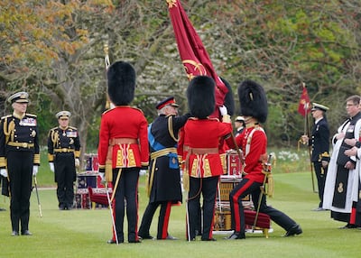 King Charles III presents new colours to The King's Company of the Grenadier Guards in April. Reuters