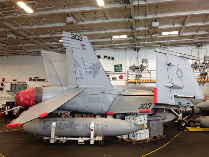 A combat jet seen in the hangar of the USS George HW Bush on March 22, 2017.