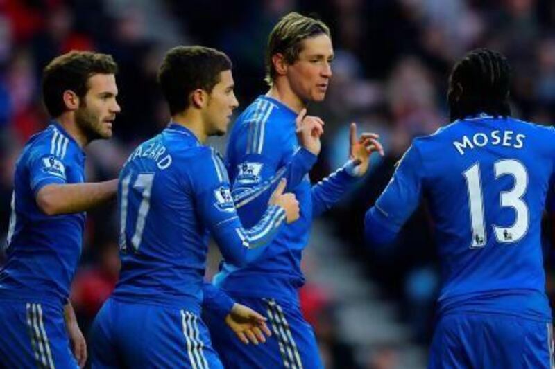 Chelsea have to get the best out of Fernando Torres, Juan Mata and Victor Moses, all continental champs. Andrew Yates / AFP