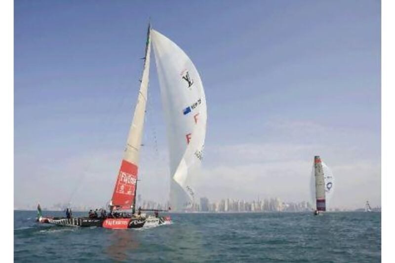 Emirates Team New Zealand practices in an Americas Cup Class boat off the coast of Dubai.