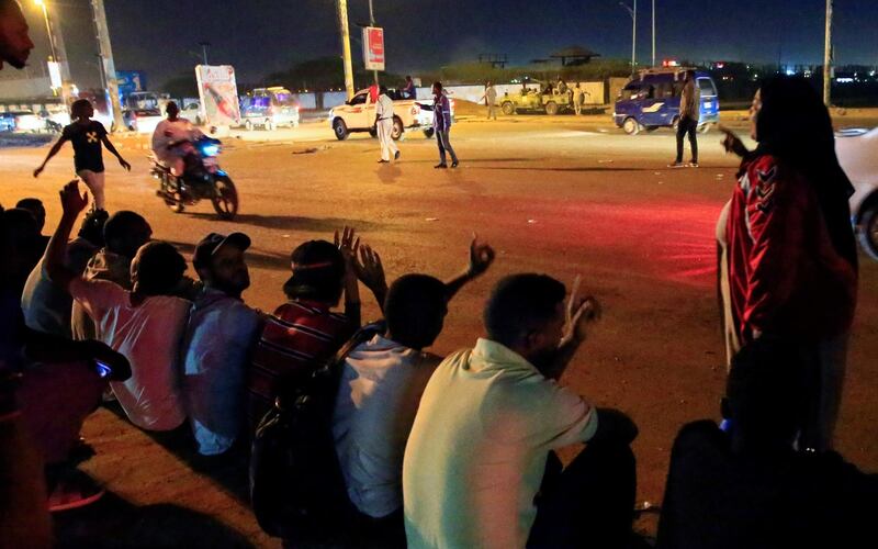 Civilians gather near the area where gunmen opened fire outside buildings used by Sudan's National Intelligence and Security Service (NISS) in Khartoum, Sudan January 14, 2020. REUTERS/Mohamed Nureldin Abdallah